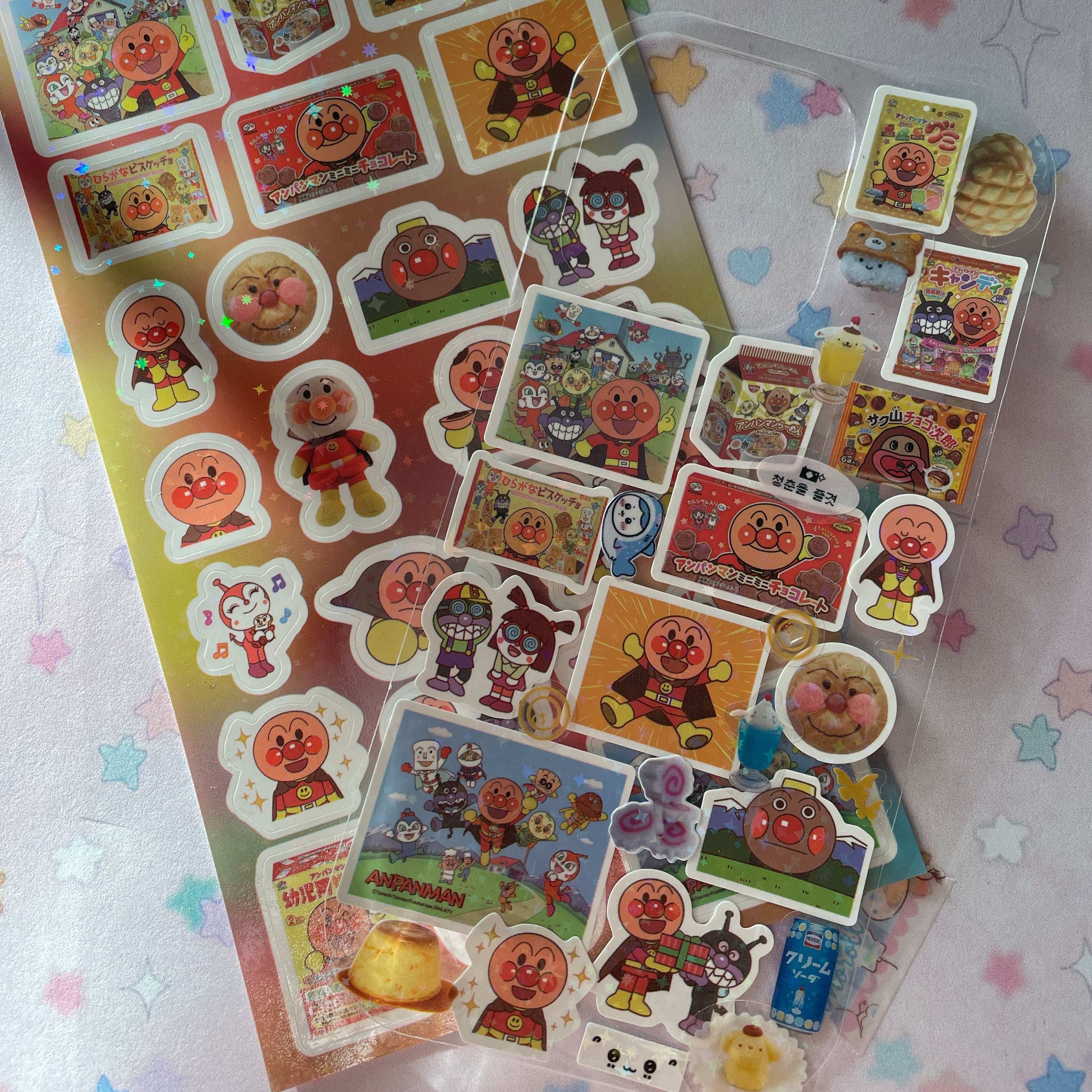 Collection of colorful stickers on a transparent sheet with a star-patterned background
